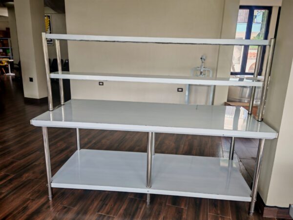 Mesa de trabajo en Acero Inoxidable de 2.10 mts. con Isla de 2 niveles